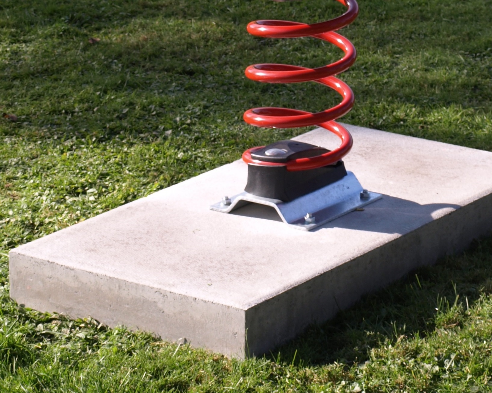 Plaque de base en béton pour jeux sur ressort